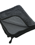 Dark gray microfiber detailing towel with black trim and mesh backing from The Detailer set