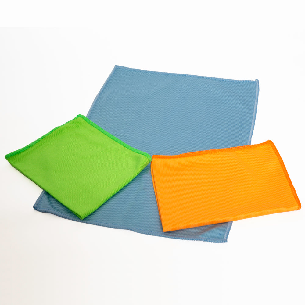 Three colorful cloths (green, blue, orange) on a white background