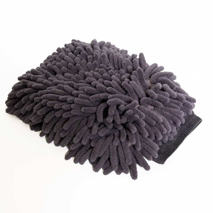 Gray microfiber cleaning mitt comes with The Detailer Car Cleaning Set on a white background