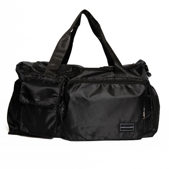 Black Kingsley and Harper duffel bag with a visible brand label on a white background