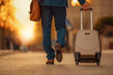 Frequent traveller with suitcase an bag