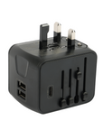 Black Globetrotter universal travel adapter with USB ports and plug pins