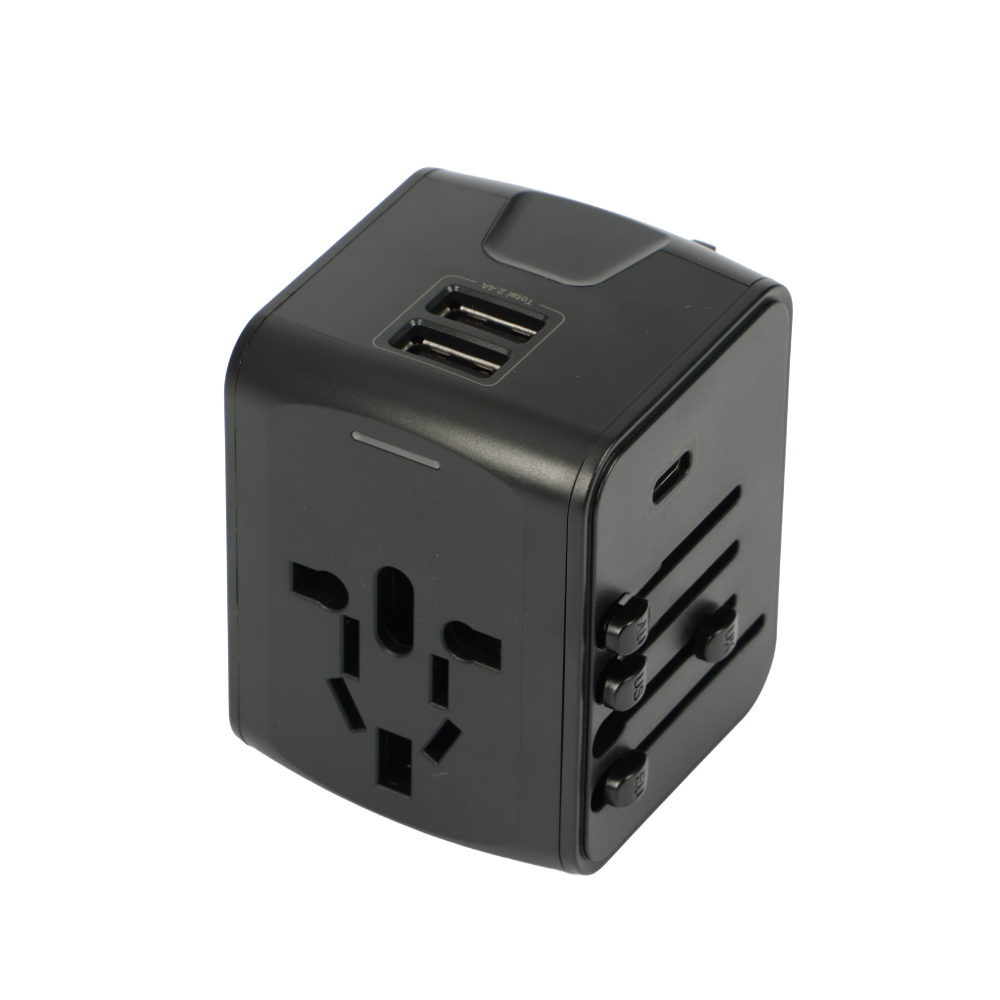 Black Globetrotter cube travel adapter with international plugs and USB ports