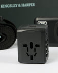 Black Kingsley & Harper universal travel adapter with USB ports in Globetrotter Set