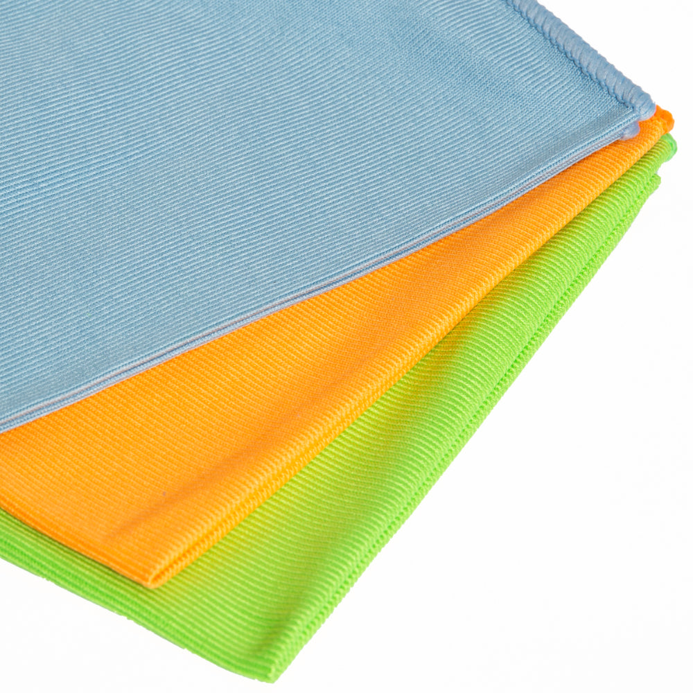 Three colorful cloths stacked on a white background