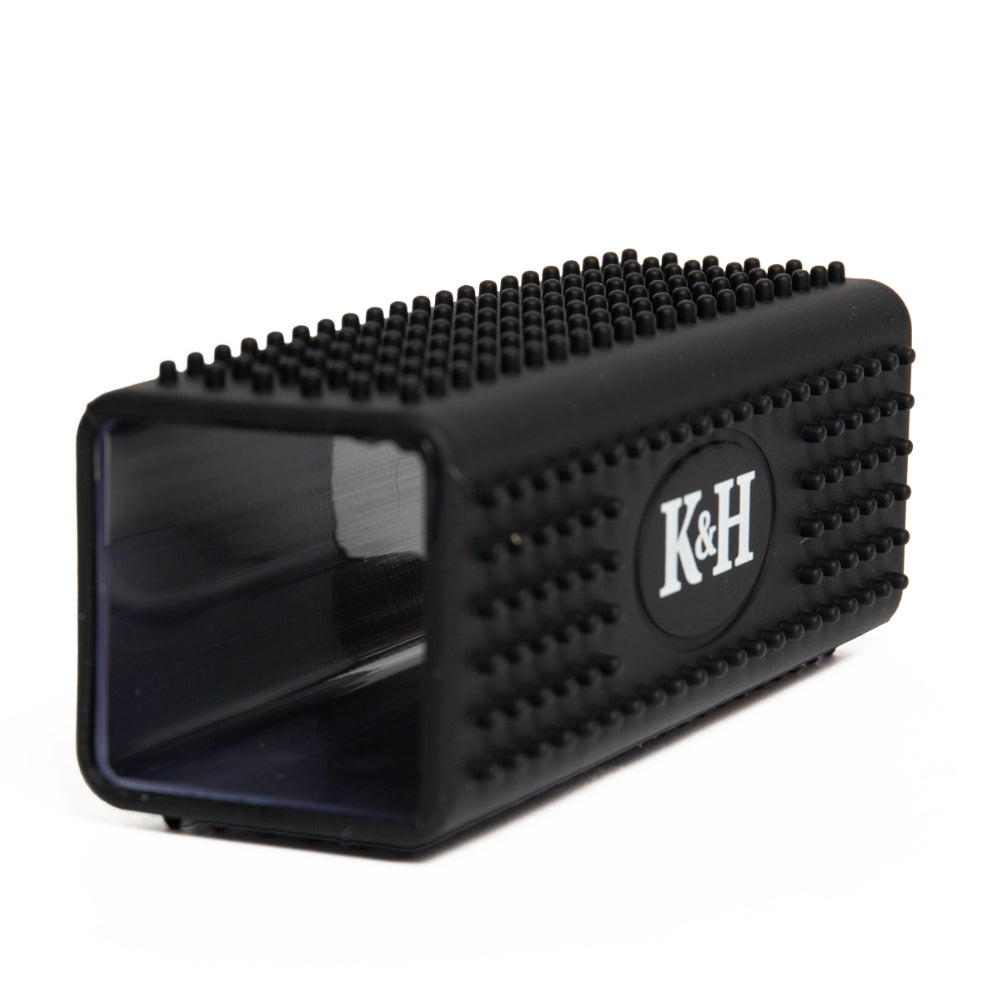 Black rubber dog brush with K&amp;H logo on a white background